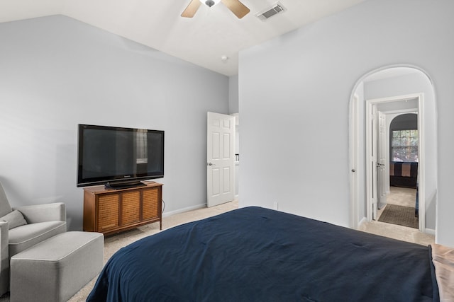 carpeted bedroom with lofted ceiling and ceiling fan