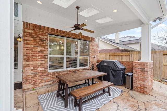 view of patio featuring ceiling fan and area for grilling