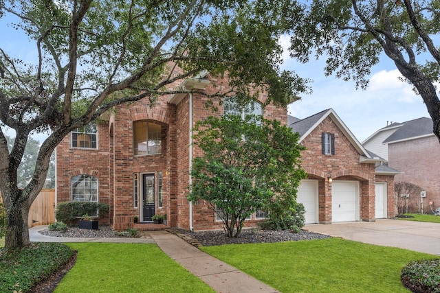 front facade with a garage and a front yard