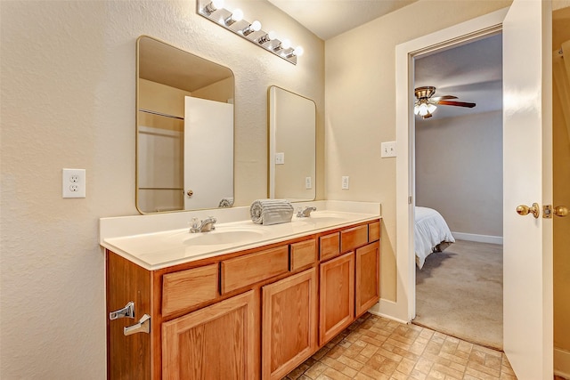 bathroom featuring vanity and ceiling fan