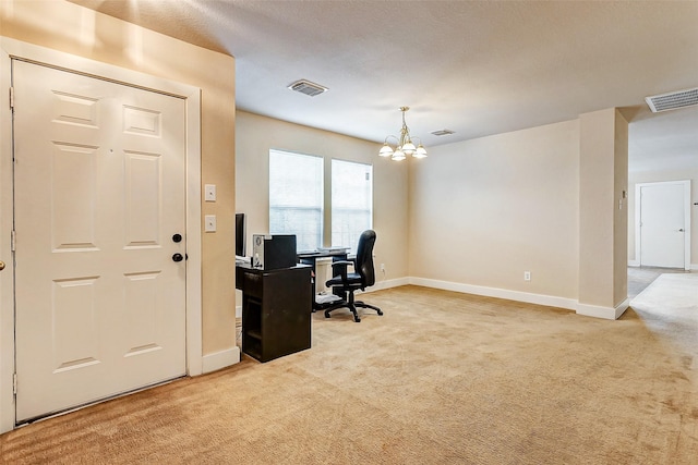 carpeted office with a notable chandelier