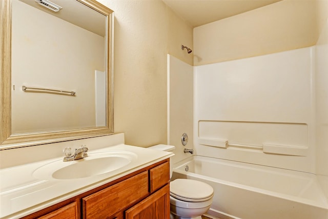 full bathroom featuring vanity, shower / bathing tub combination, and toilet