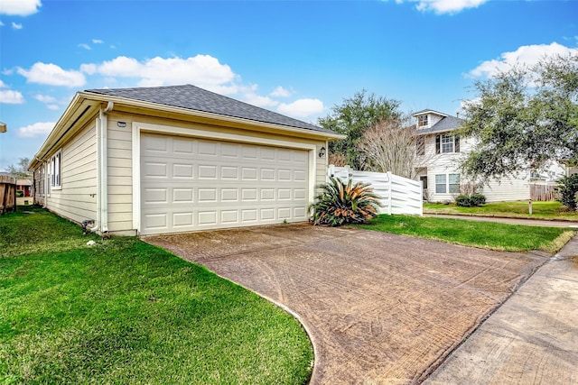 garage with a lawn