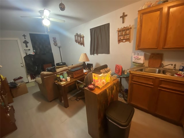 office area featuring sink and ceiling fan