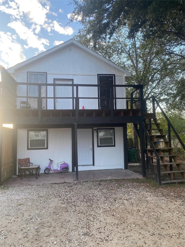 rear view of house featuring a patio area