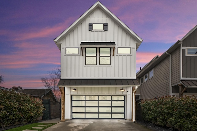 modern farmhouse style home with a garage