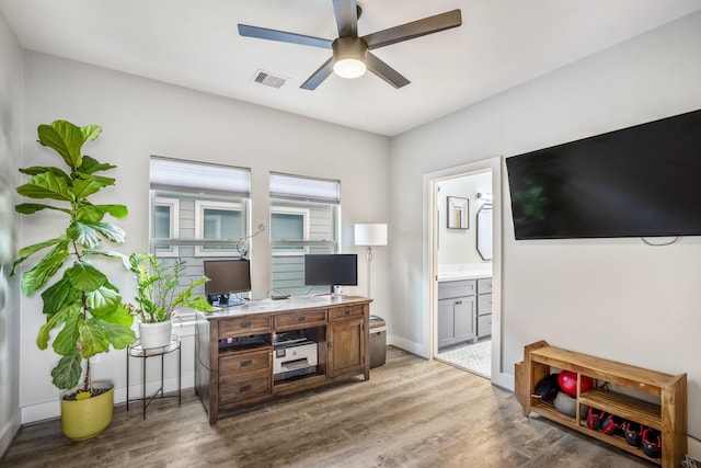 office area with hardwood / wood-style floors and ceiling fan