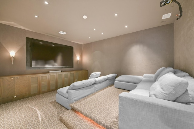 home theater room with recessed lighting, visible vents, and light colored carpet