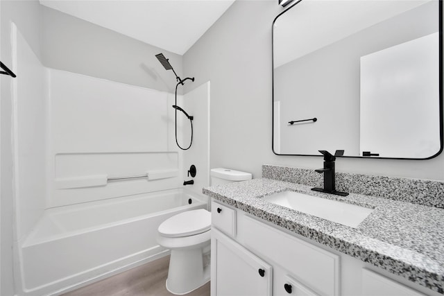 full bathroom with shower / tub combination, hardwood / wood-style floors, vanity, and toilet