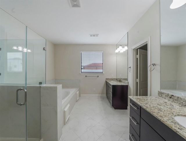 bathroom with vanity and plus walk in shower