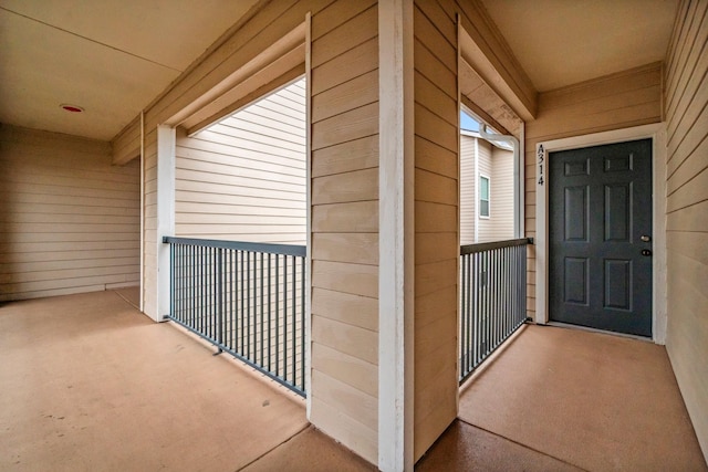 doorway to property with a balcony