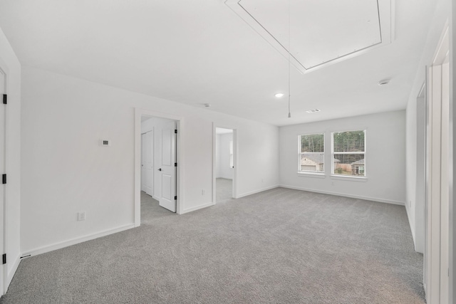 empty room with light colored carpet