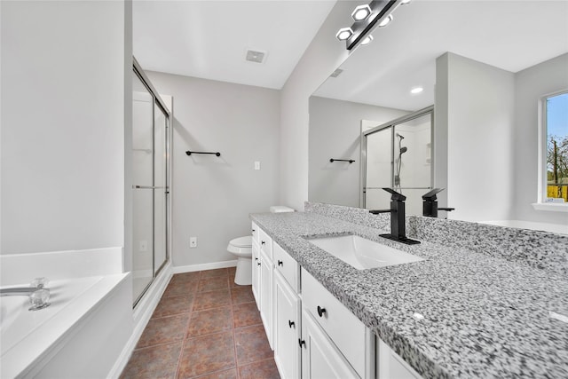 full bathroom featuring tile patterned floors, vanity, toilet, and separate shower and tub