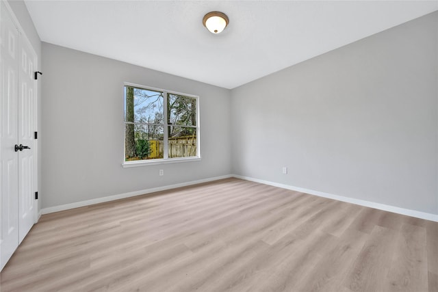 empty room with light wood-type flooring