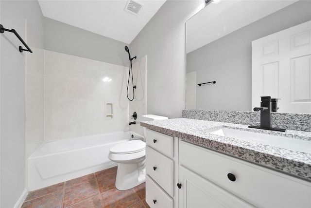 full bathroom featuring washtub / shower combination, vanity, toilet, and tile patterned floors