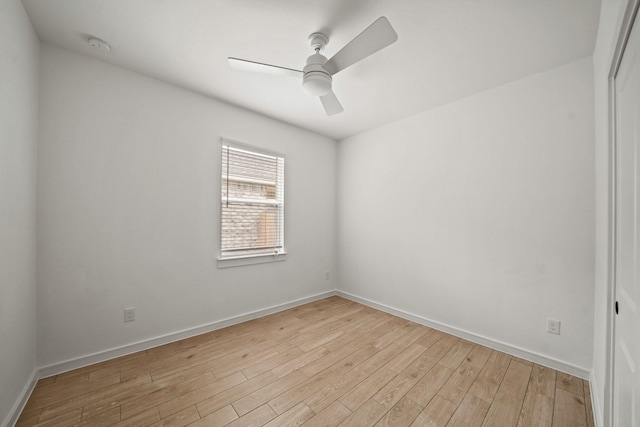 empty room with light hardwood / wood-style floors and ceiling fan