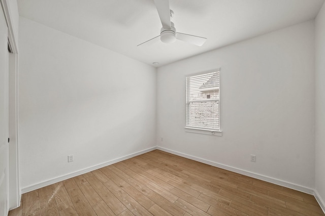 unfurnished room with light hardwood / wood-style flooring and ceiling fan