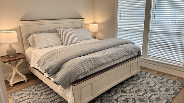 bedroom with wood-type flooring