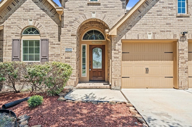 doorway to property featuring a garage