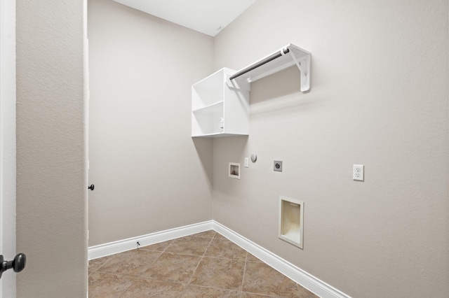 laundry room with gas dryer hookup, washer hookup, hookup for an electric dryer, and light tile patterned flooring