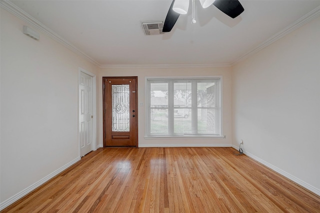 entrance foyer with crown molding, ceiling fan, and light wood-type flooring