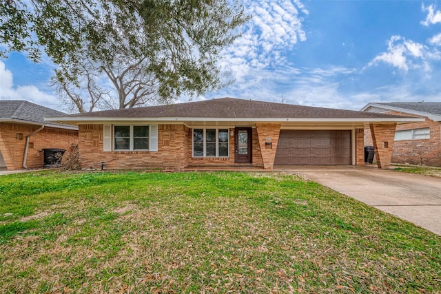 single story home featuring a garage and a front lawn