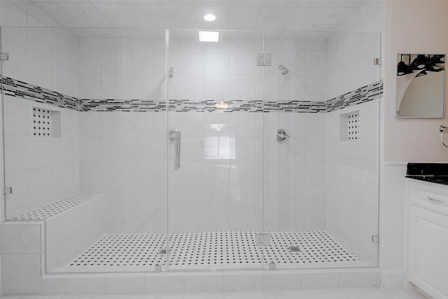 bathroom with vanity and an enclosed shower