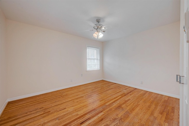 unfurnished room with ceiling fan and light hardwood / wood-style flooring