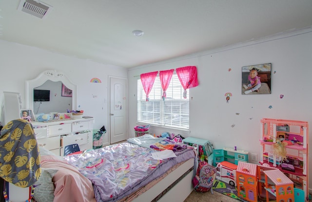 bedroom featuring carpet