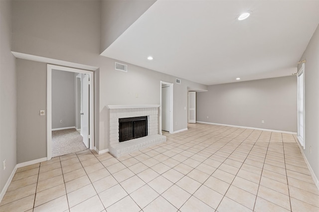 unfurnished living room featuring a fireplace