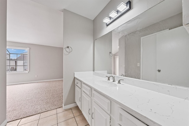 bathroom with vanity and tile patterned flooring