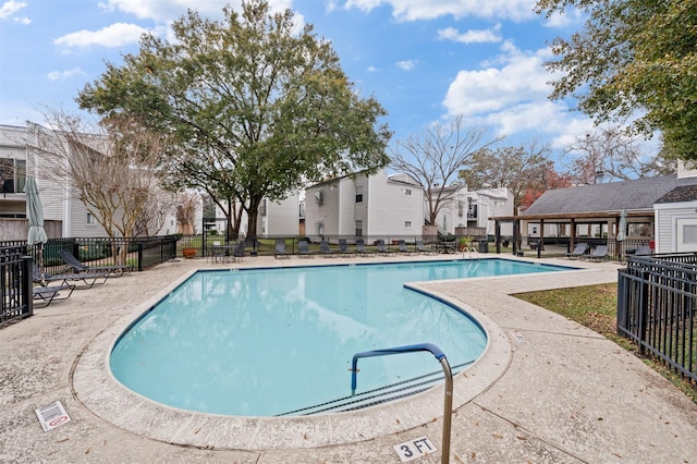 view of swimming pool featuring a patio