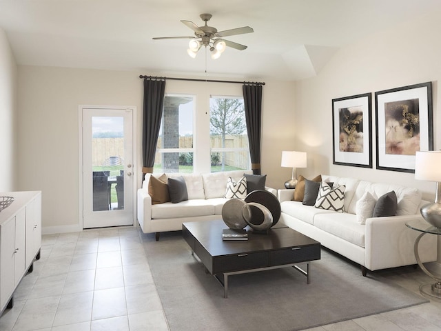 tiled living room with ceiling fan