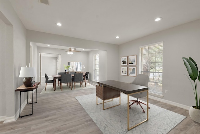 home office featuring light hardwood / wood-style flooring