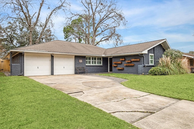 ranch-style home featuring a garage and a front yard