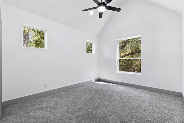 unfurnished room with ceiling fan, plenty of natural light, high vaulted ceiling, and carpet