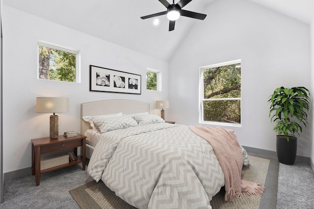 bedroom featuring high vaulted ceiling, ceiling fan, and carpet flooring