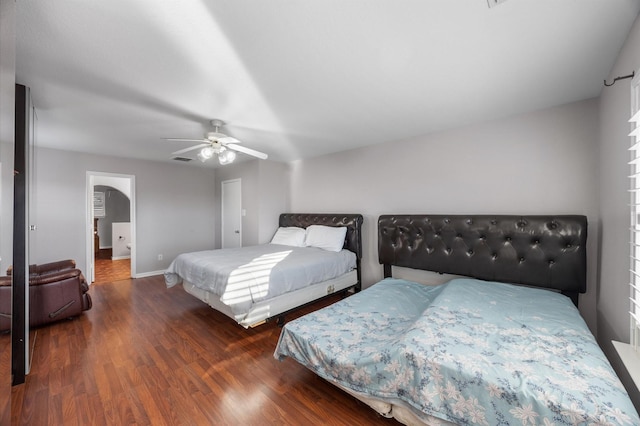 bedroom featuring dark wood-type flooring and ceiling fan