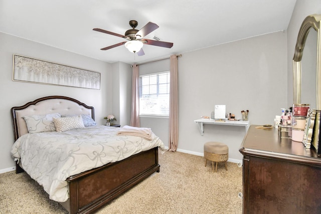 bedroom with light colored carpet and ceiling fan