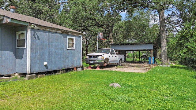 view of yard featuring a carport