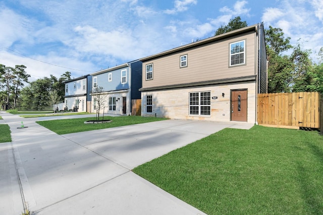 view of front of property with a front lawn