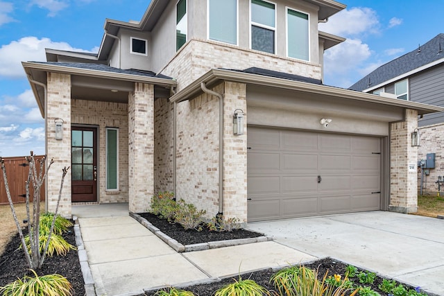 view of front of home with a garage