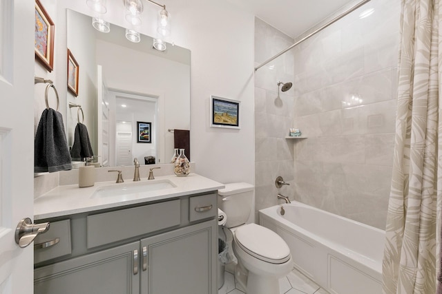 full bathroom featuring toilet, tile patterned floors, vanity, and shower / bathtub combination with curtain