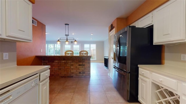 kitchen with pendant lighting, light tile patterned floors, white dishwasher, white cabinets, and black refrigerator with ice dispenser