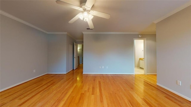 empty room featuring crown molding, ceiling fan, and light hardwood / wood-style flooring