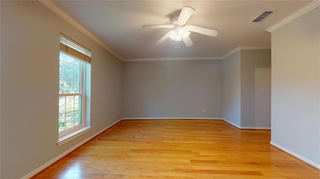 unfurnished room featuring ceiling fan, ornamental molding, and light hardwood / wood-style flooring