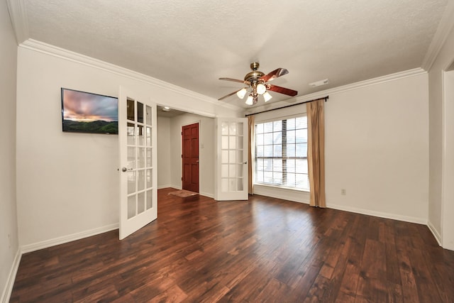 unfurnished room with dark hardwood / wood-style floors, ceiling fan, crown molding, a textured ceiling, and french doors