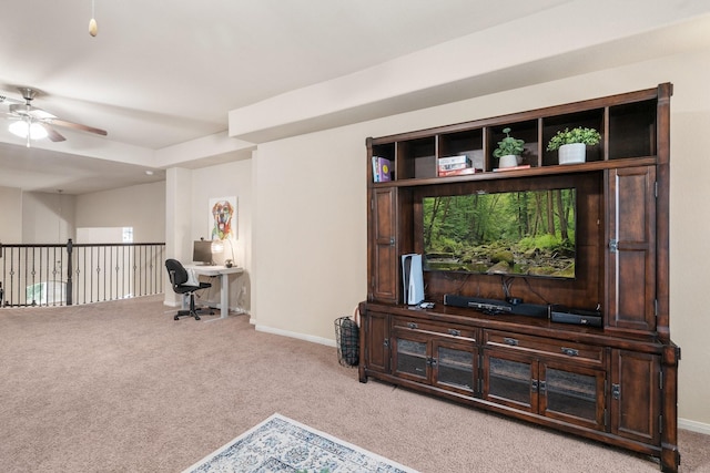 interior space featuring ceiling fan and light carpet