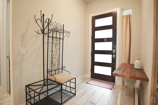 entrance foyer with light hardwood / wood-style flooring