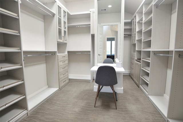 spacious closet featuring carpet floors and visible vents